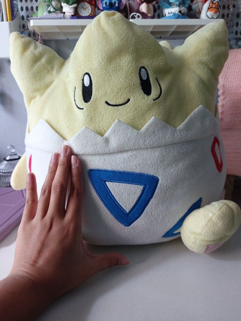 Banpresto Togepi Pokémon Plush (Category: Plushies & Soft Toys) located in Las Pinas. Submitted by cute.thingz (Listing ID 1468744776, Image 2). Description: - Brand: Banpresto (authentic with tag attached) - Character: Togepi (Large size) - Material: Soft yellow and white fabric with detailed embroidery - Condition: Clean and well-kept - Perfect for Pokémon fans and collectors.
