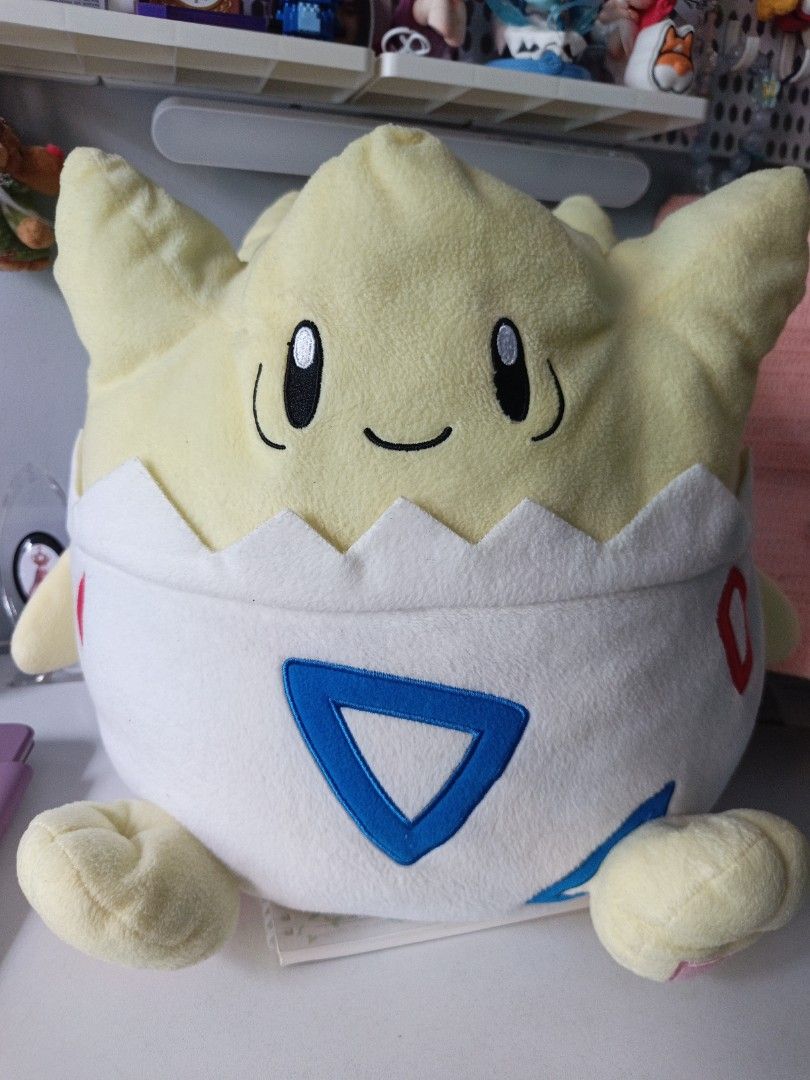 Banpresto Togepi Pokémon Plush (Category: Plushies & Soft Toys) located in Las Pinas. Submitted by cute.thingz (Listing ID 1468744776, Image 1). Description: - Brand: Banpresto (authentic with tag attached) - Character: Togepi (Large size) - Material: Soft yellow and white fabric with detailed embroidery - Condition: Clean and well-kept - Perfect for Pokémon fans and collectors.