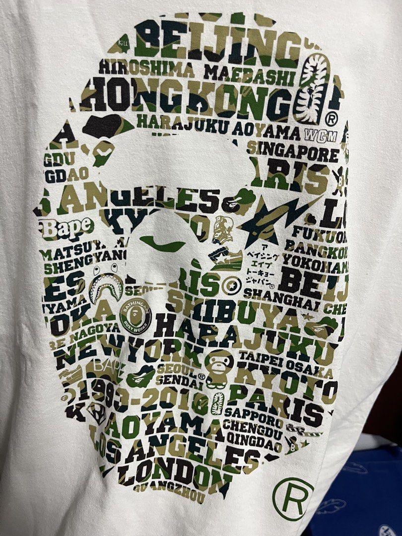 Bape 25th anniv camo big head authenthic (Category: Tshirts & Polo Shirts ) located in Adams. Submitted by y2kchocothrift (Listing ID 1468822027, Image 2). Description: Bape 25anniv authenthic Dimes22/29 Excellent condi Flawless Moneyback if proven fake.