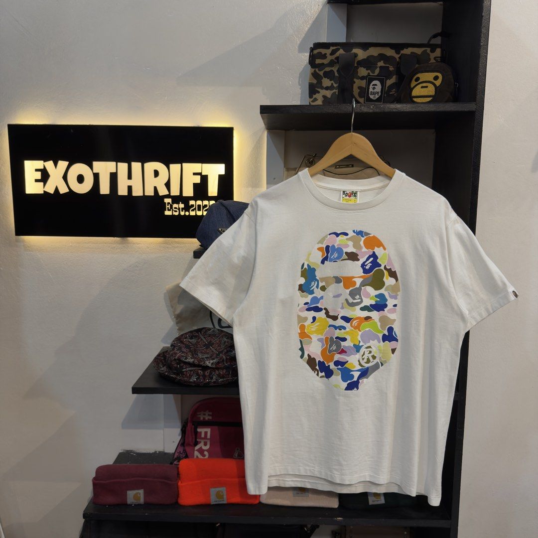 BAPE BIG HEAD MIRROR COTTON CANDY WHITE TSHIRT (Category: Tshirts & Polo Shirts ) located in Manila. Submitted by jerichomal82553 (Listing ID 1468910021, Image 1). Description: BAPE BIG HEAD MIRROR COTTON CANDY WHITE TSHIRT 21 by 28.