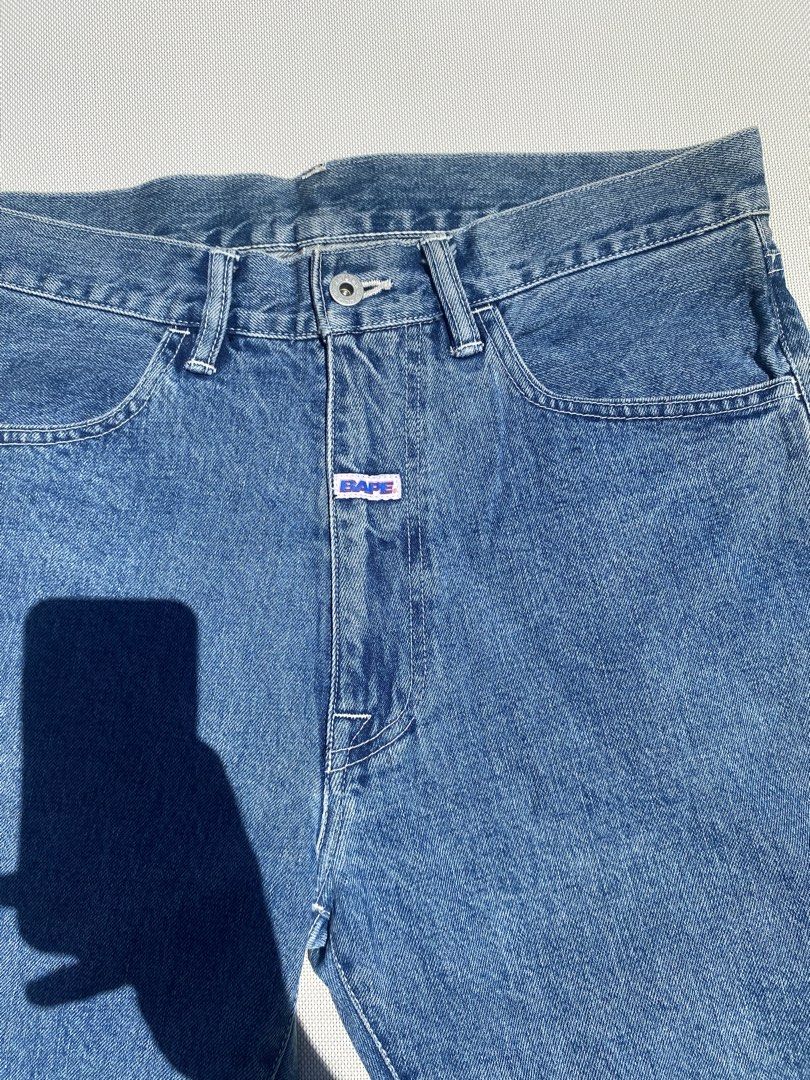 BAPE Denim Shorts Size M Blue (Category: Shorts) located in Tagum. Submitted by waaap420 (Listing ID 1468896829, Image 3). Description: - Brand: BAPE (A Bathing Ape) - Item: Denim Shorts - Color/Wash: Clean Blue Wash - Size: Medium - Fit: Classic fit with zipper fly and button closure - Details: Small BAPE logo tag on front placket - Feature: Bold BAPE lettering printed across back right pocket - Condition: Excellent, ready to wear.