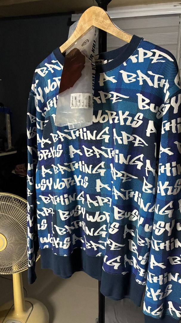 Bape Graffiti Check Crewneck Blue LongSleeve (Category: Coats, Jackets and Outerwear) located in Palayan City. Submitted by goodcatch_store (Listing ID 1468883308, Image 2). Description: Bape Graffiti Check Crewneck Long Sleeve Brand New with Ziplock W -23 L - 28.5.