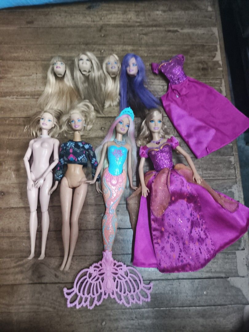 BARBIE BUNDLE!! VERY LOWERED PRICE! (Category: Kids Toys) located in Quezon City. Submitted by an_drei (Listing ID 1468724326, Image 1). Description: AS IS! WYSIWYG ALL ISSUES ARE IN THE PICTURES WILL GIVE MORE FREEBIE !DOLLS! LIANA NO LONGER SING BUT HER LIGHTS STILL WORKS WHEN GOWN WAS FLIPPED COLOR CHANGING MERMAID OG NECKLACE BUT CROWN IS REPLACED, MISSING FABRIC IN TAIL AND HAS MISSING CHUNK IN THE MIDDLE OF TAIL MILLIE HAS SLIGHT 1 CUT FING