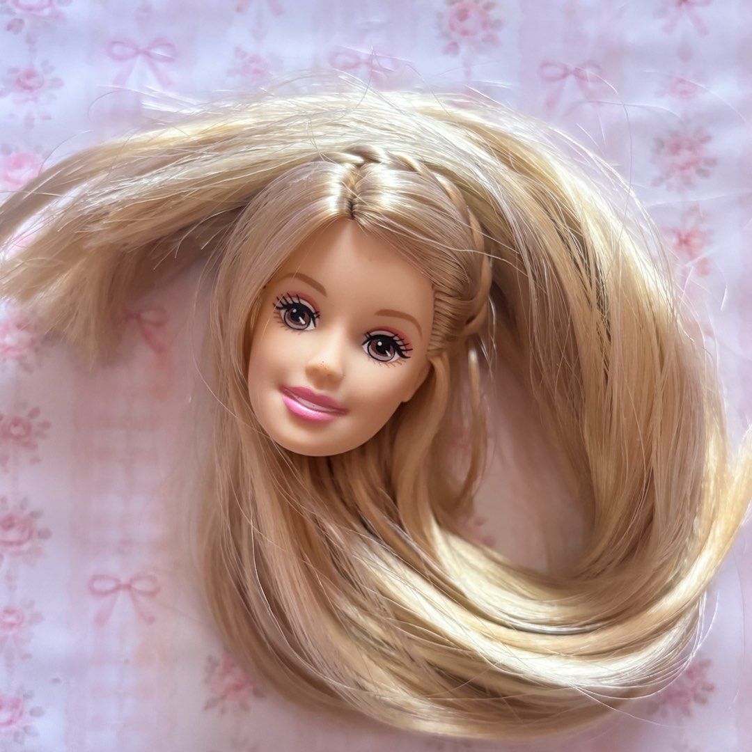 Barbie Doll Head (Category: Kids Toys) located in Tagum. Submitted by mcdolly (Listing ID 1468775932, Image 1). Description: ‼️READ DESCRIPTION‼️ - no refund - you will get the doll(s) as is - what you see is what you get - flash express or j&t only - ones shipped wala na akong control sa item - NO LP Flaws: - HEAD ONLY - Hair rerooted to saran - no flaws.
