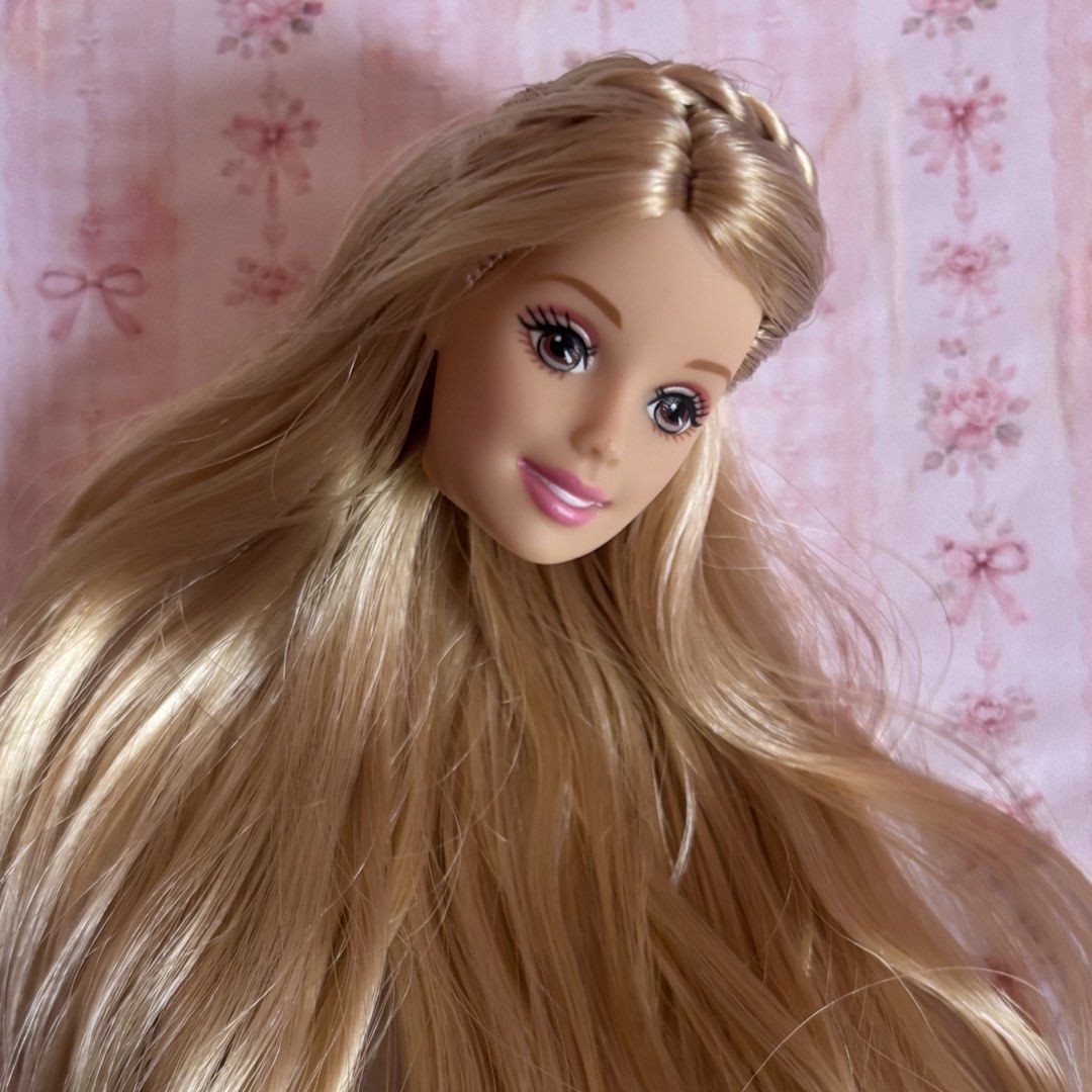 Barbie Doll Head (Category: Kids Toys) located in Tagum. Submitted by mcdolly (Listing ID 1468775932, Image 2). Description: ‼️READ DESCRIPTION‼️ - no refund - you will get the doll(s) as is - what you see is what you get - flash express or j&t only - ones shipped wala na akong control sa item - NO LP Flaws: - HEAD ONLY - Hair rerooted to saran - no flaws.