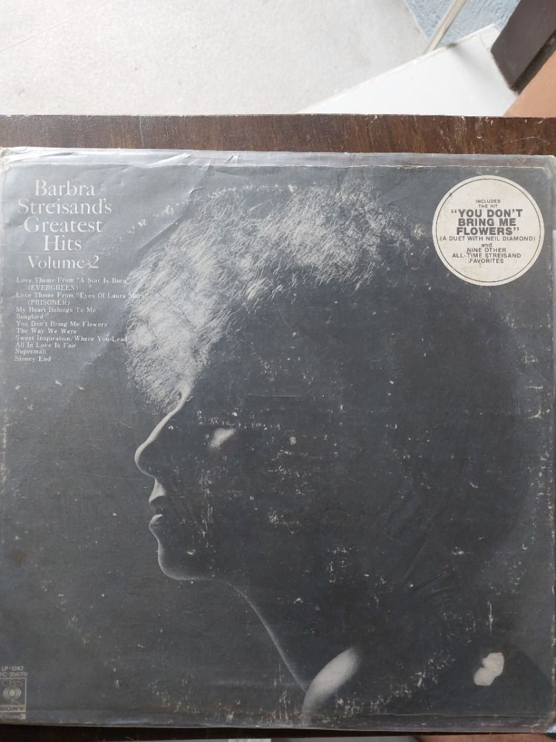 Barbra Streisans Greatest Hits Volume 2 Vinyl Record (Category: Vinyls) located in Quezon City. Submitted by safefish_95f205 (Listing ID 1468720288, Image 1). Description: - Artist & Title: Barbra Streisand - Greatest Hits Volume 2 Vinyl LP - Label / Catalog No.: CBS / Sony (LP-1243) - Notable Tracks: Includes 'You Don't Bring Me Flowers' and 'Evergreen' - Condition: Black vinyl plays at 33 1/3 stereo; jacket has visible edge wear and scuffing fr
