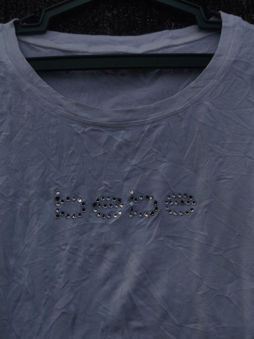 BEBE shirt size xs on tag (Category: Shirts) located in Davao. Submitted by aristotlekhld (Listing ID 1468808810, Image 3). Description: 550+sf ni issue pang y2k nyo.