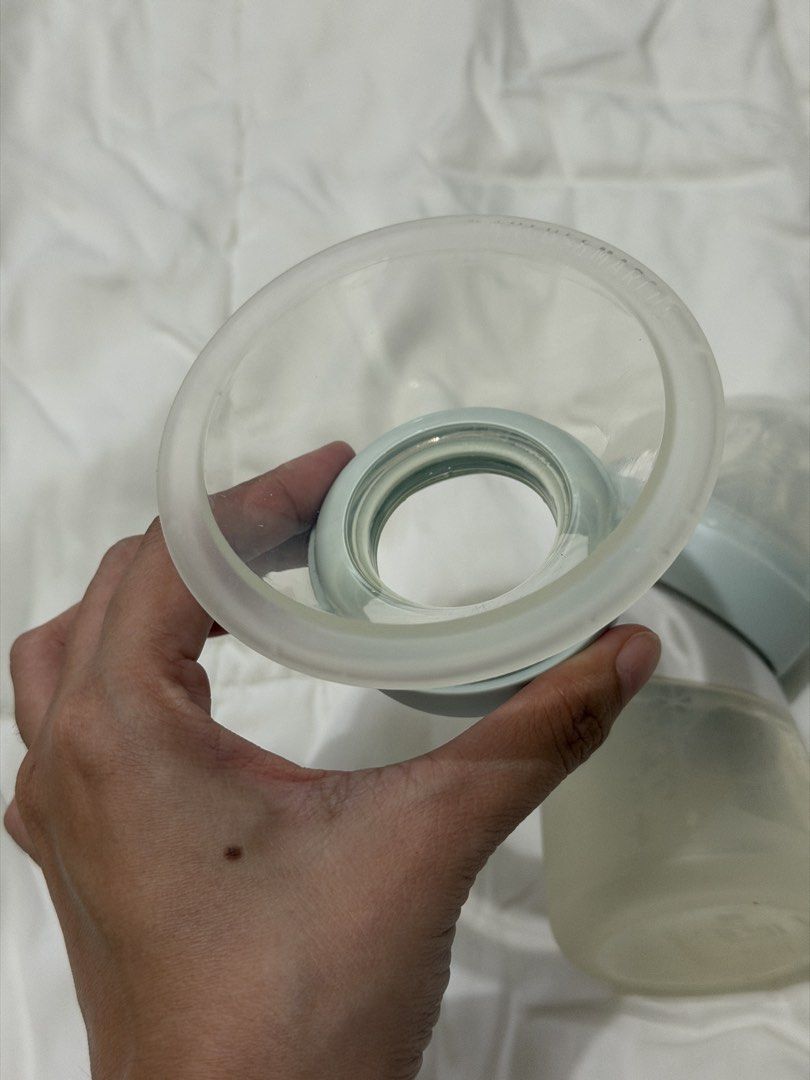 Bebemarc Silicone Breast Pump & Antibacterial Feeding Set (Category: Breastfeeding & Bottle Feeding) located in Mandaluyong City. Submitted by allorashoppe (Listing ID 1468918389, Image 2). Description: - Authentic bebe marc Marcus & Marcus silicone baby bottle - Color: Soft grey and mint green tones - Capacity: Up to 4 fl oz or 120 ml with clear measurement markings - Ergonomic curved body designed for easy gripping - Gentle and safe material id