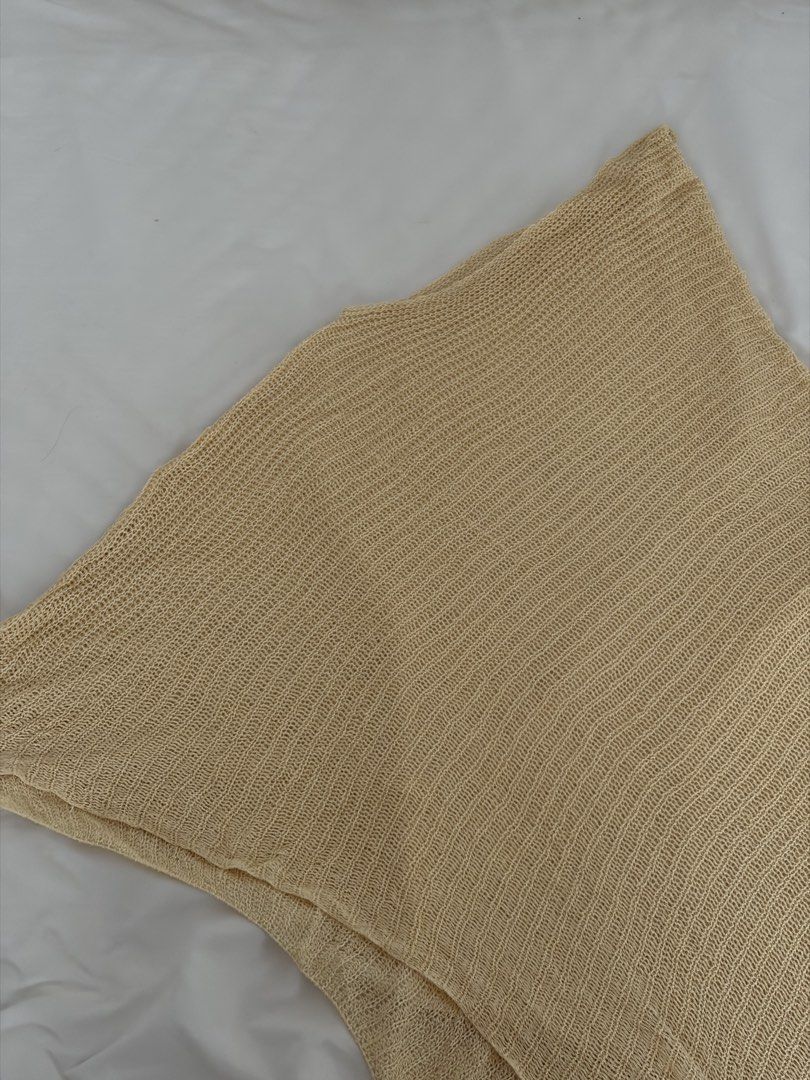 Beige Knit Open-Weave Cover Up Top (Category: Sleeveless) located in Las Pinas. Submitted by thriftedfinds_ (Listing ID 1468868516, Image 1). Description: - Color: Neutral beige - Fit: Relaxed and breezy - Style: Sleeveless with an open knit weave - Best for: Hot weather or easy layering - Condition: Clean and well cared for.