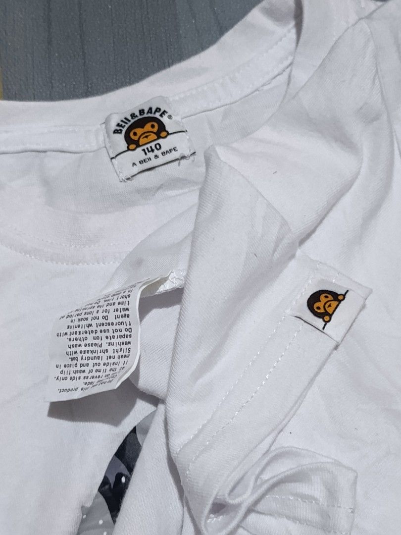 Bell and bathing ape baby tee (Category: Shirts) located in Davao. Submitted by jeff_thrifts (Listing ID 1468874546, Image 3). Description: dimes: 14x21 no issue excellent condition.