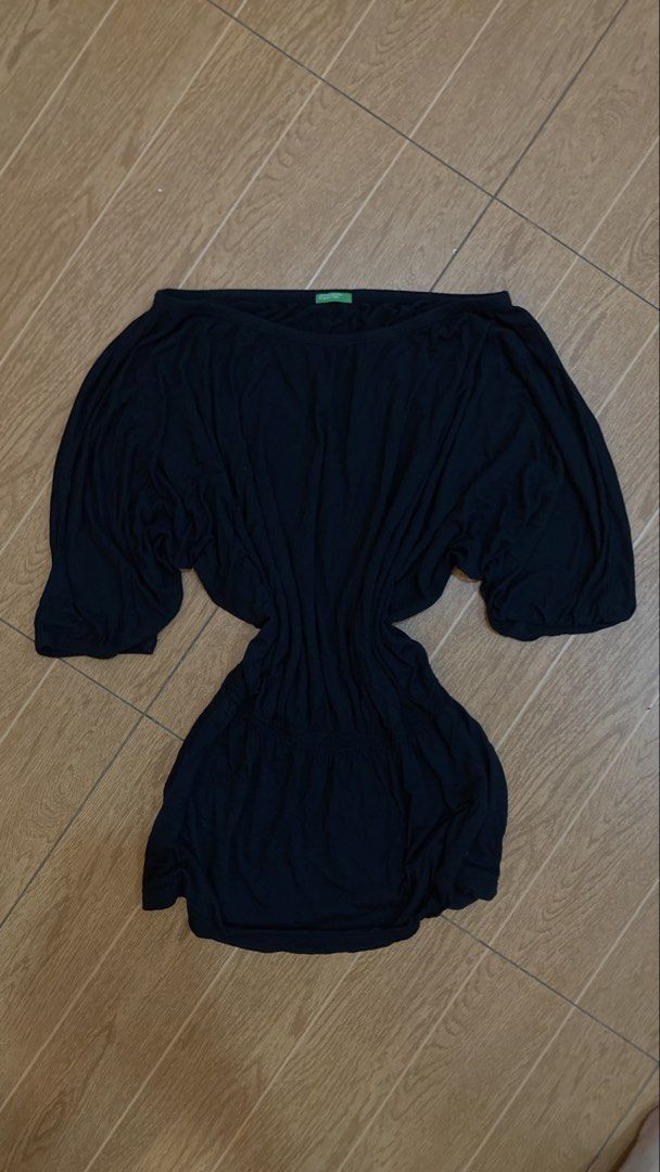 Benetton Black Off-Shoulder Dress (Category: Dresses) located in Subic. Submitted by bottomjeanzgals (Listing ID 1468842733, Image 1). Description: - Brand: United Colors of Benetton - Color: Classic Black - Style: Off-shoulder dress with batwing sleeves and gathered waist - Material: Soft and stretchy fabric for all-day comfort - Condition: Excellent, clean with no stains or holes .