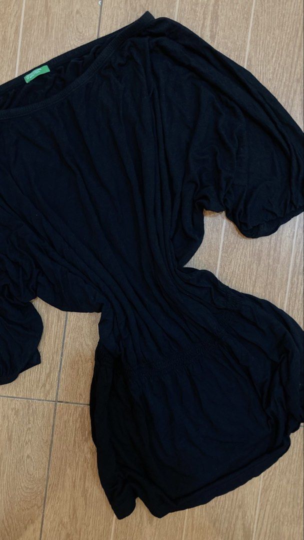 Benetton Black Off-Shoulder Dress (Category: Dresses) located in Subic. Submitted by bottomjeanzgals (Listing ID 1468842733, Image 3). Description: - Brand: United Colors of Benetton - Color: Classic Black - Style: Off-shoulder dress with batwing sleeves and gathered waist - Material: Soft and stretchy fabric for all-day comfort - Condition: Excellent, clean with no stains or holes .