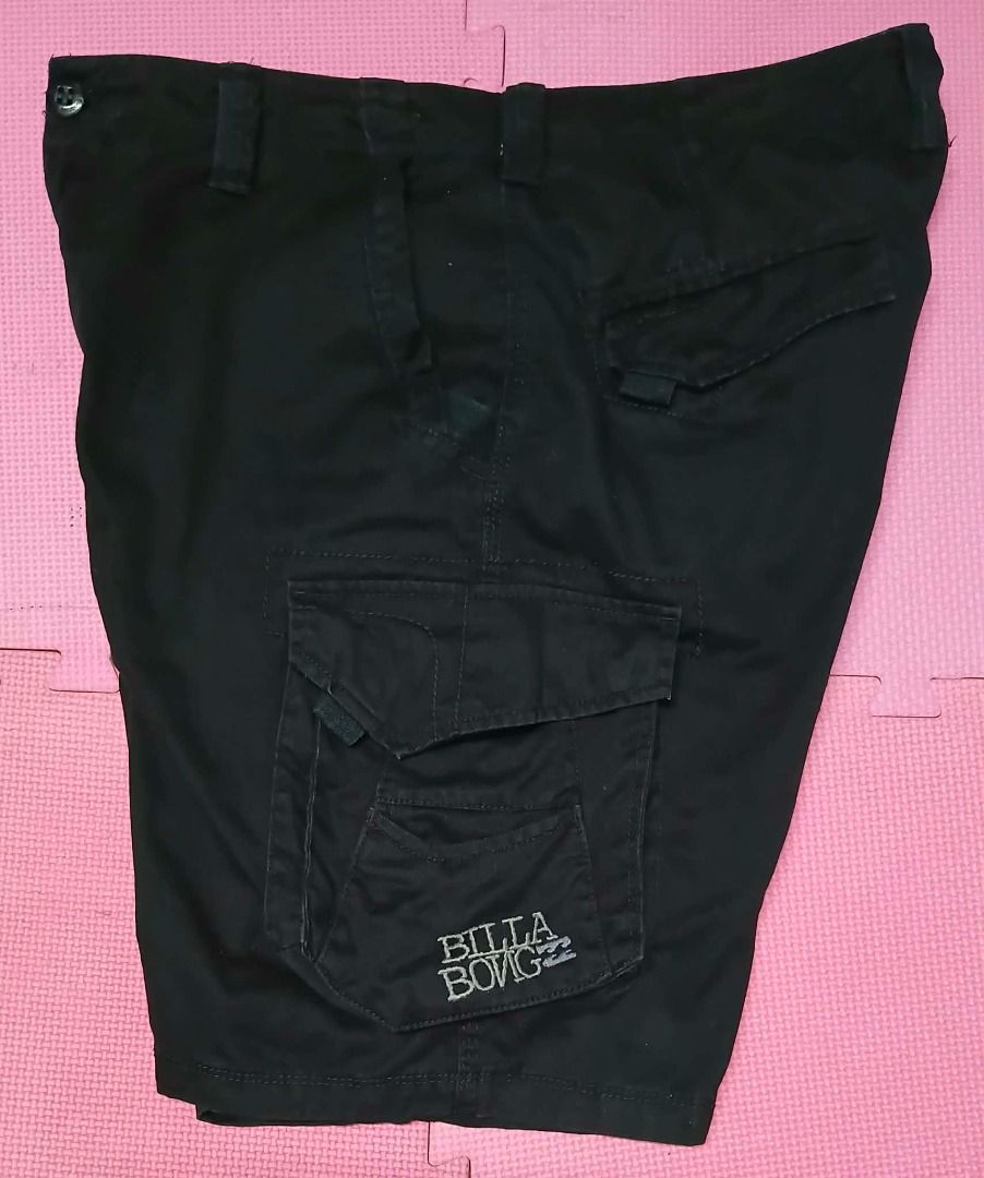 Billabong Black Cargo Shorts Size 34 (Category: Shorts) located in Caloocan City. Submitted by silverbird_6c038f (Listing ID 1468847145, Image 2). Description: - Brand: Billabong - Color: Black - Size: 34 - Material: 100% Cotton for maximum comfort - Fit: Standard fit with belt loops and button fly - Storage: Multiple functional pockets on sides and back - Details: Embroidered Billabong logo on the cargo pocket - Condition: Great for casual wear,