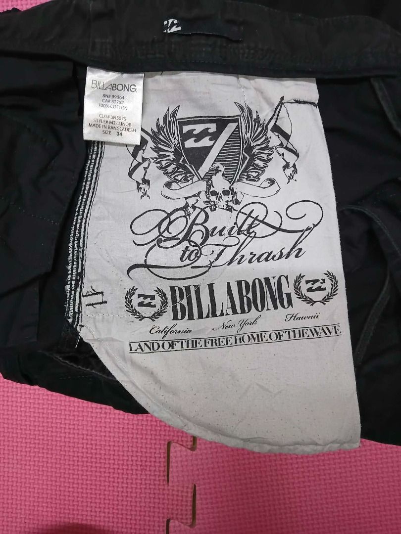 Billabong Black Cargo Shorts Size 34 (Category: Shorts) located in Caloocan City. Submitted by silverbird_6c038f (Listing ID 1468847145, Image 3). Description: - Brand: Billabong - Color: Black - Size: 34 - Material: 100% Cotton for maximum comfort - Fit: Standard fit with belt loops and button fly - Storage: Multiple functional pockets on sides and back - Details: Embroidered Billabong logo on the cargo pocket - Condition: Great for casual wear,