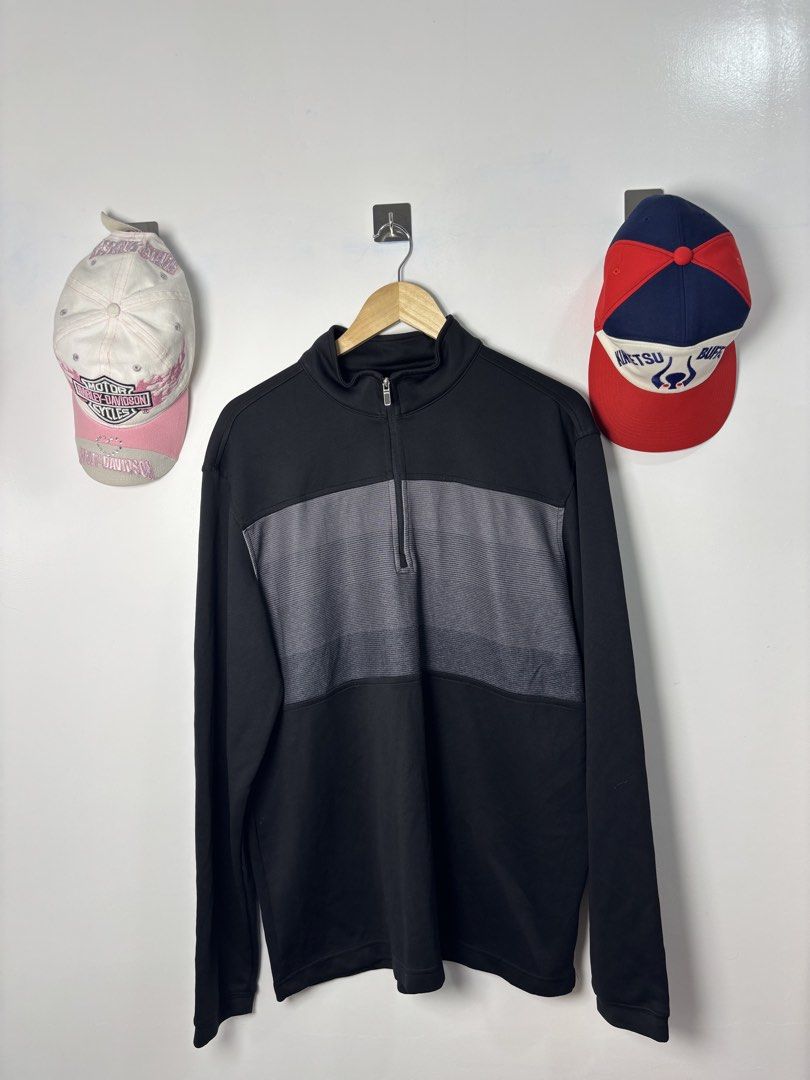 Black and grey quarter zip pullover sweater (Category: Coats, Jackets and Outerwear) located in Calbayog City. Submitted by zaxcheus_castillo1708 (Listing ID 1468752853, Image 1). Description: - Color: Black with a wide grey gradient striped panel across the chest - Style: Long sleeve pullover with a quarter zip collar - Fit & Feel: Smooth fabric with comfortable ribbed cuffs and hem - Best For: Perfect layering piece for cooler weather - Conditi