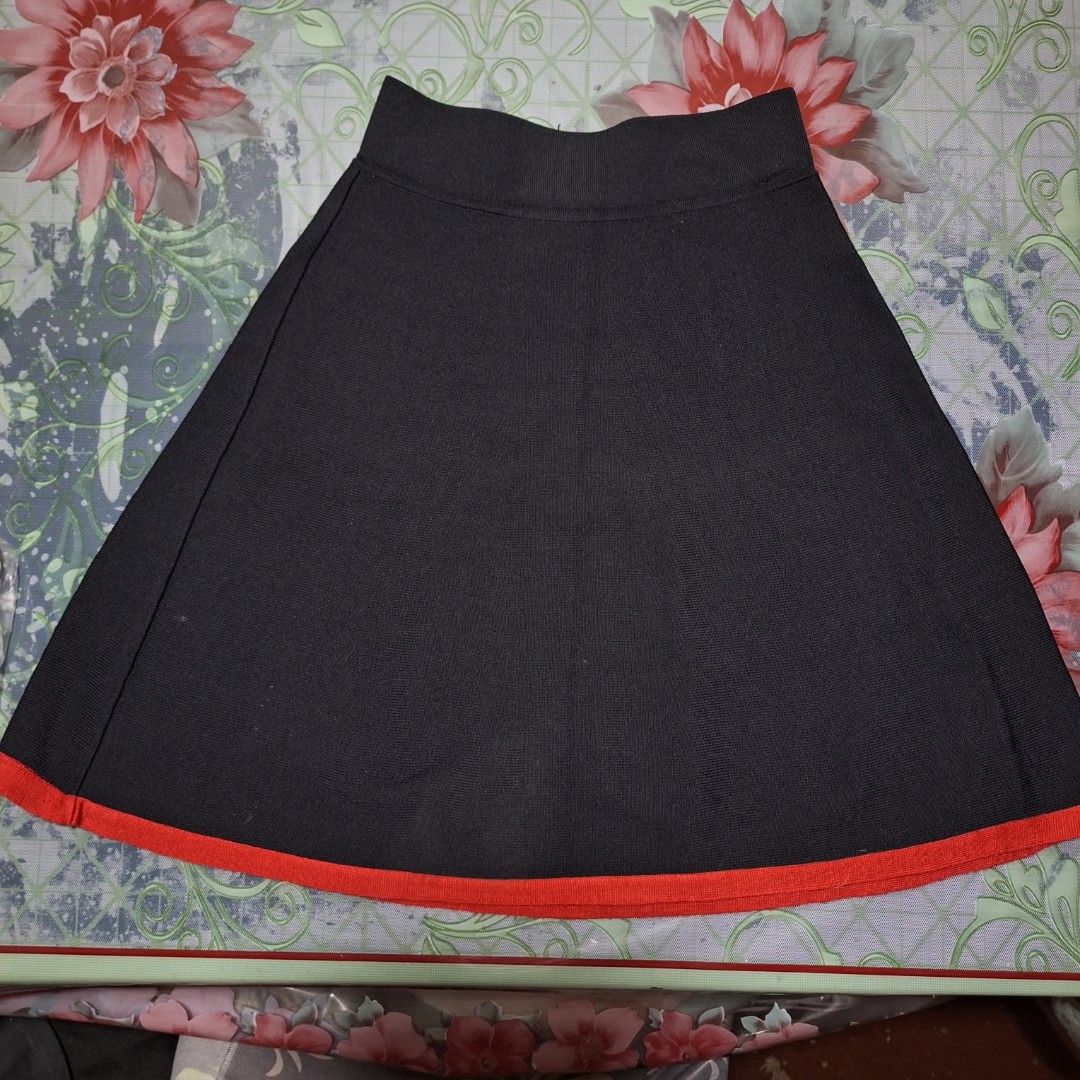 Black and Red A-line Skirt (Category: Skirts) located in Pasig City. Submitted by zelzelly (Listing ID 1468758332, Image 1). Description: Black flare or A-line skirt RFS: Decluterring and never used at least once. • Size XS-S • Length - 20inch • Good as new • Ribbed elastic waistband 📍Can do meetups in any LRT2 stations - Lalamove • Accepts cash on hand and Gcash as payment. • Buyer must shoulder the shipping!!.