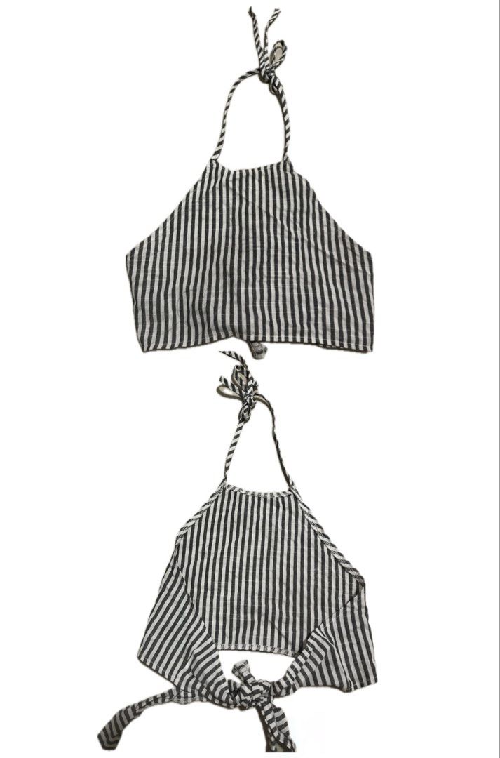 Black and White Striped Halter Crop Top (Category: Sleeveless) located in Koronadal. Submitted by keenpenguin_6af0c6 (Listing ID 1468816569, Image 1). Description: - Pattern: Classic black and white vertical stripes - Design: Halter neck with self-tie back closure - Fit: Cropped length, fits small to medium - Fabric: Lightweight and breathable - Styling: Perfect for summer, beach trips, or pairing with high-waisted denim and skirts.