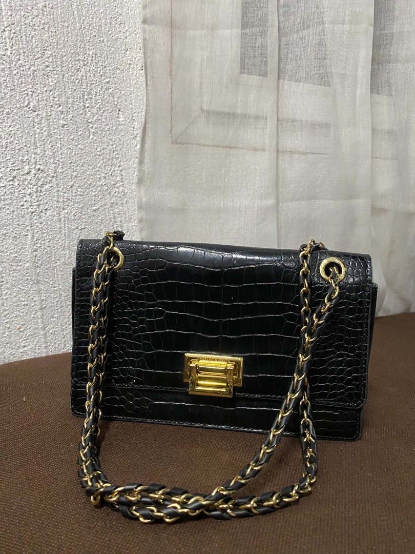 Black Bags Bundle Charles & Keith Straightforward Élan (Category: Tote Bags) located in Manila. Submitted by micadanillie (Listing ID 1468895866, Image 1). Description: - Bundle of 4 practical black bags for daily rotation - Charles & Keith croc-embossed shoulder bag with gold chain strap - Straightforward plain black tote bag - Black handle bag with stylish gold buckle - Élan round canvas tote bag with white contrast stitching ranging 100-400 on