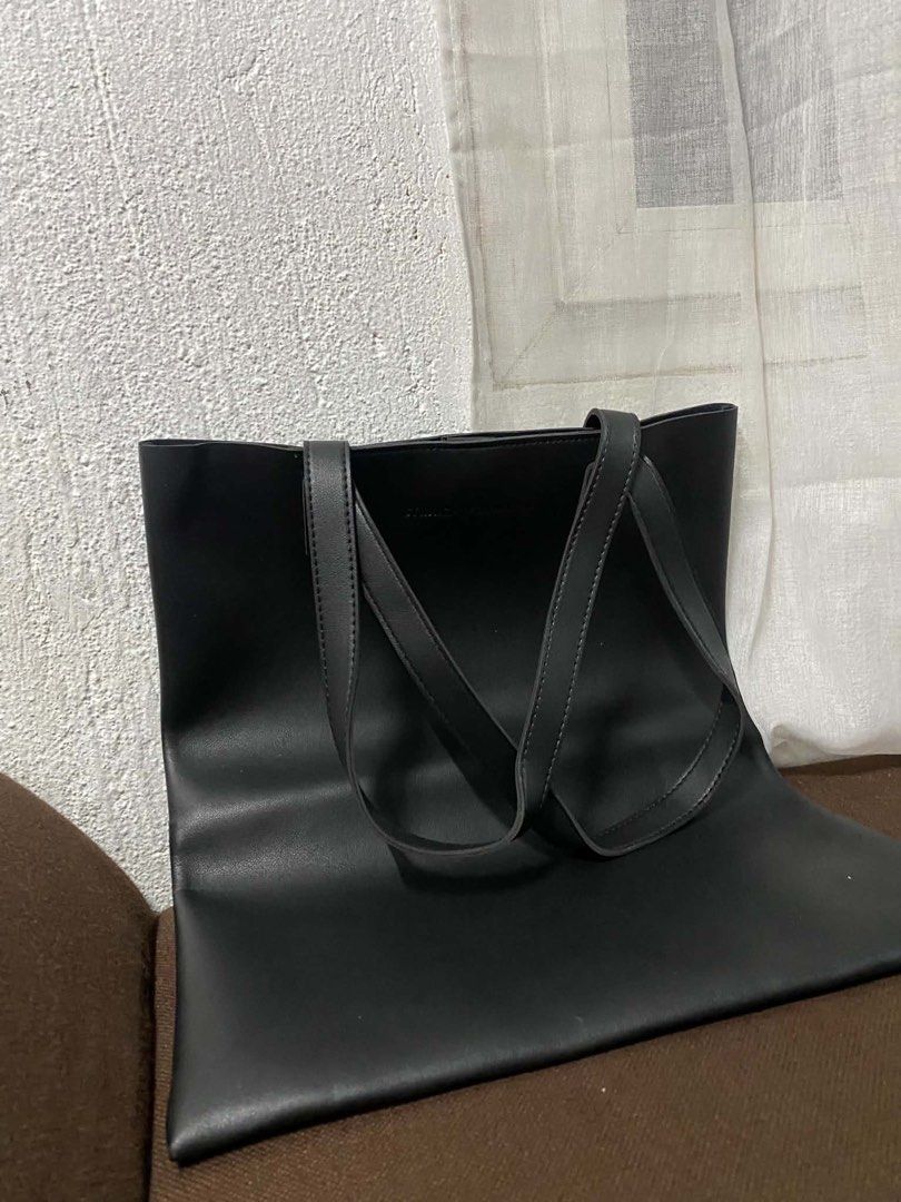 Black Bags Bundle Charles & Keith Straightforward Élan (Category: Tote Bags) located in Manila. Submitted by micadanillie (Listing ID 1468895866, Image 2). Description: - Bundle of 4 practical black bags for daily rotation - Charles & Keith croc-embossed shoulder bag with gold chain strap - Straightforward plain black tote bag - Black handle bag with stylish gold buckle - Élan round canvas tote bag with white contrast stitching ranging 100-400 on