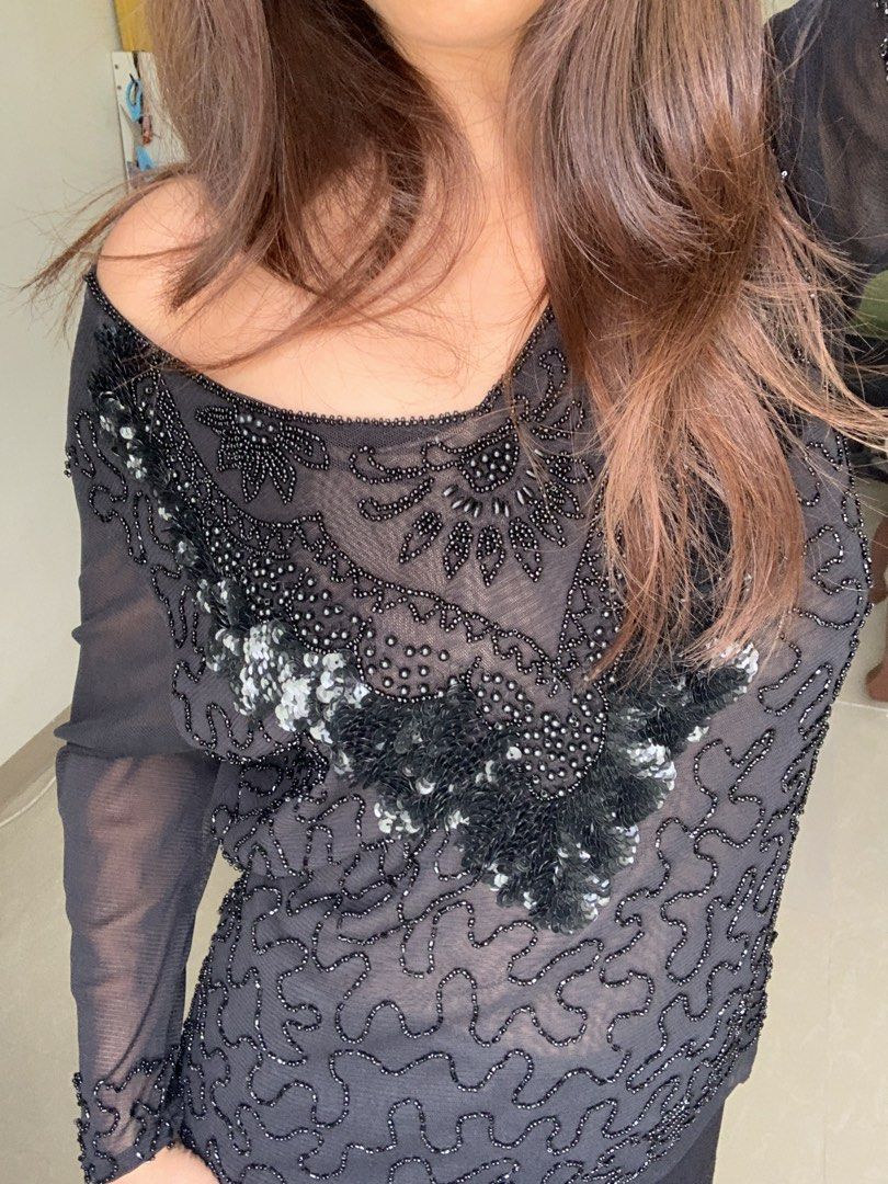 black beaded sequin sheer top v-neck 3/4 sleeves (Category: Blouses) located in General Trias. Submitted by peebscloset (Listing ID 1468749952, Image 1). Description: - small to medium - black sheer mesh - sequins are still intact, loose beads are just few - 3/4 sleeves - used once as lydia deetz in beetlejuice for halloween.