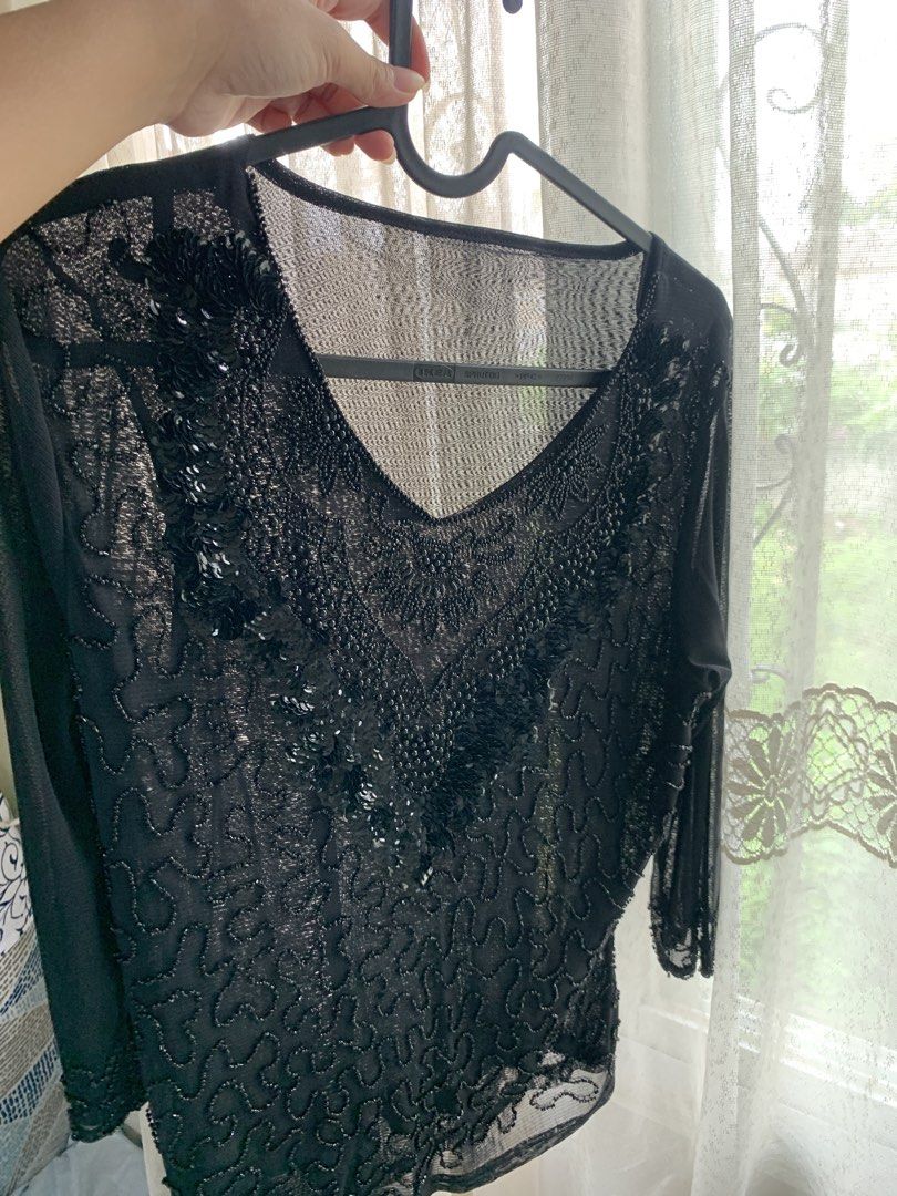black beaded sequin sheer top v-neck 3/4 sleeves (Category: Blouses) located in General Trias. Submitted by peebscloset (Listing ID 1468749952, Image 2). Description: - small to medium - black sheer mesh - sequins are still intact, loose beads are just few - 3/4 sleeves - used once as lydia deetz in beetlejuice for halloween.