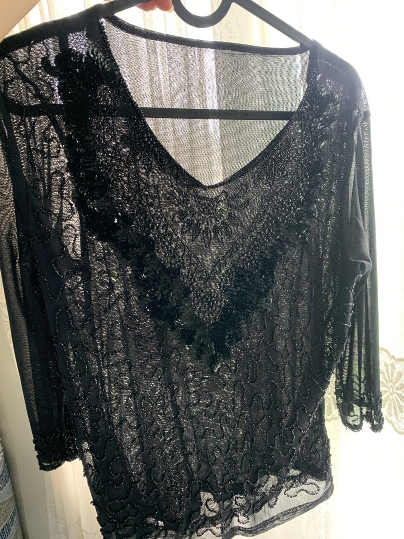 black beaded sequin sheer top v-neck 3/4 sleeves (Category: Blouses) located in General Trias. Submitted by peebscloset (Listing ID 1468749952, Image 3). Description: - small to medium - black sheer mesh - sequins are still intact, loose beads are just few - 3/4 sleeves - used once as lydia deetz in beetlejuice for halloween.
