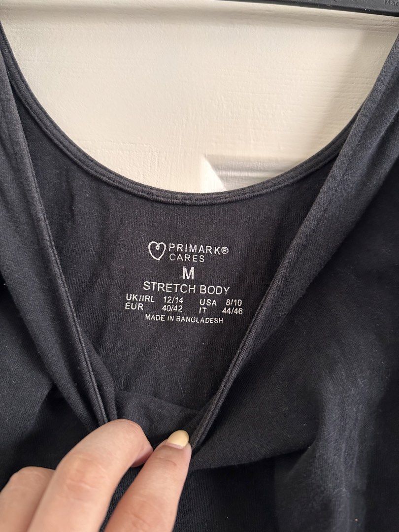Black Bodysuit Square Neck (L) (Category: Sleeveless) located in Bacoor. Submitted by alliabuysandsells (Listing ID 1468919906, Image 3). Description: primark black bodysuit fits M-L has a small hole pls check photos for reference.