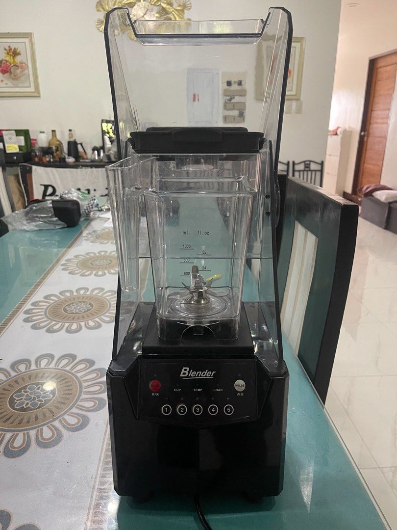Black Commercial Blender with Sound Enclosure Shield (Category: Juicers, Blenders & Grinders) located in Cabanatuan. Submitted by clearandcurate (Listing ID 1468754086, Image 1). Description: - Heavy-duty black blender with a sound-reducing enclosure shield for quiet operation - Digital control panel featuring speeds 1-5 and a pulse function - Durable stainless steel blade system for smooth blending results - Ideal for both home kitchens and prof
