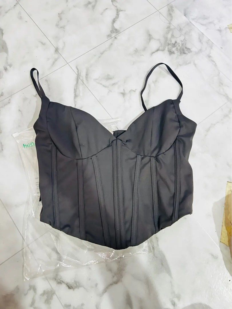 Black corset top zipper back (Category: Sleeveless) located in Manila. Submitted by reddie_j (Listing ID 1468792951, Image 1). Description: small on tag bnew.