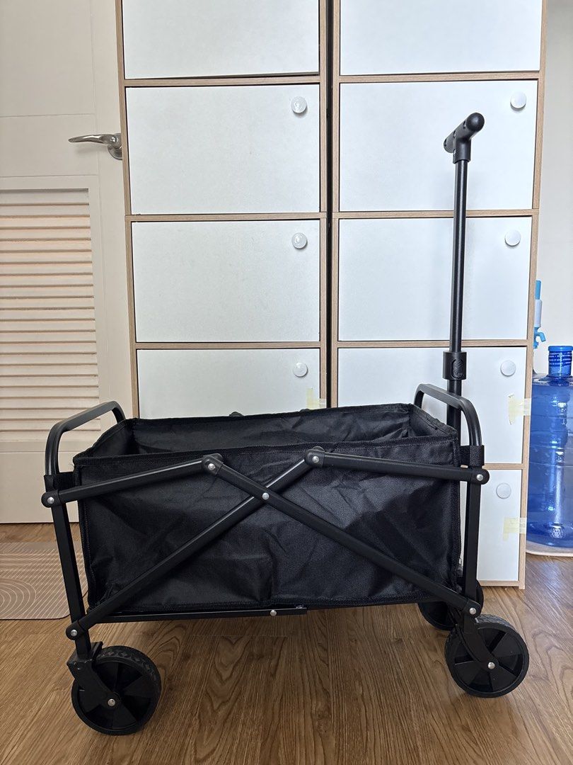 Black Foldable Utility Wagon with Pull Handle (Category: Strollers) located in Pasig City. Submitted by zemira.elaine (Listing ID 1468778799, Image 1). Description: Rfs: needed a bigger wagon for toddler Brand new. No issue.