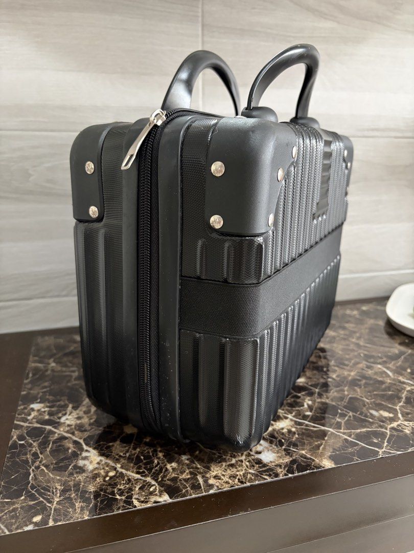 Mini suitcase cosmetic bag (Category: Luxury Bags & Wallets) located in Paranaque City. Submitted by declutterbykat (Listing ID 1468725330, Image 3). Description: ‼️ no box 🔖 rfs: decluttering 📍 parañaque city 💸 mop: gcash or maya only 🚖 mod: lalamove, grab, or jnt .