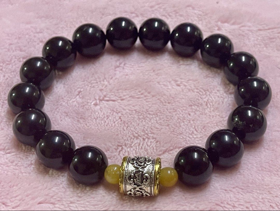 Black Obsidian Bracelet 12mm (Category: Bracelets) located in Manila. Submitted by Crystal_Oracle (Listing ID 1468929395, Image 1). Description: Black obsidian is a natural volcanic glass known for its grounding, protective, and reflective properties in crystal healing traditions. Core Benefits & Properties: • Protection & Grounding: Acts as an energetic shield that absorbs negative energy, repels psychic smog, and aligns with the root chakra for