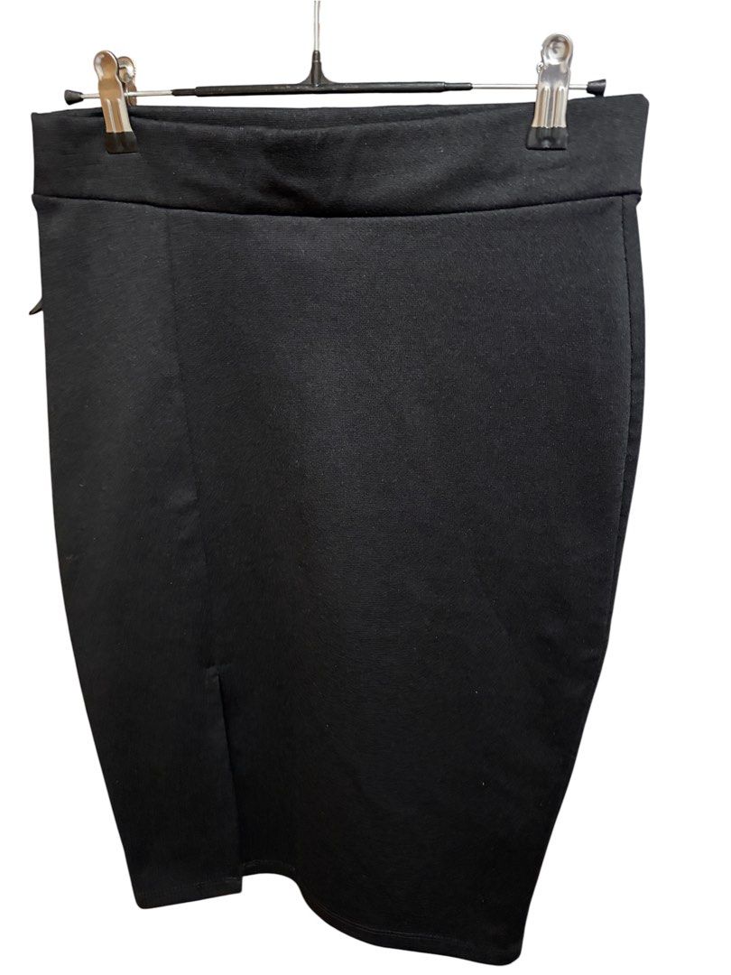 Black Pencil Skirt with Front Slit (Category: Skirts) located in Antipolo. Submitted by joyeduarte175 (Listing ID 1468854001, Image 2). Description: - Color: Solid Black - Style: Fitted pencil skirt with a subtle front side slit - Waistband: Clean, minimalist design - Material: Stretchy, comfortable fabric - Versatility: Easy to pair with both work blouses and casual tops - Condition: Brand new / Excellent (Ready to ship!) - Mode of payment: GCas