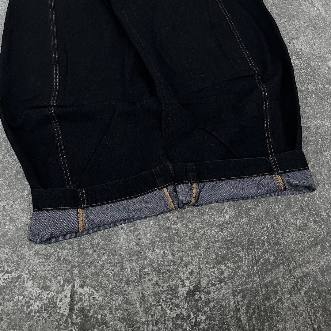 Black Raw Denim barrel pants (Category: Jeans) located in Calasiao. Submitted by johnwayned15001 (Listing ID 1468817238, Image 2). Description: Black Raw Denim barrel baggy pants Brand: 11km brand Waist: 29 Length: 40.5 Thighs: 14 Hem: 11 - Issue: None - Color Rate: 10/10 - Condition Rate: 10/10 - Hard, Thick and So Heavy Mine: 750.
