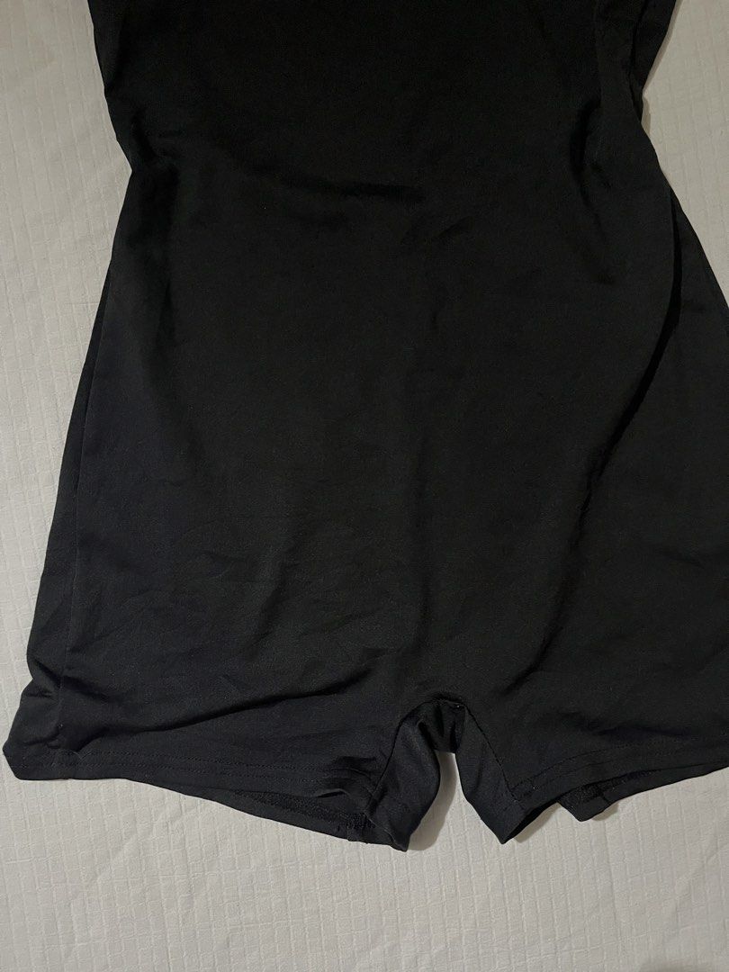 Black Scoop Neck Workout Romper (Category: Rompers) located in Quezon City. Submitted by earthtodior (Listing ID 1468732862, Image 3). Description: - Color: Classic Black - Design: Scoop neckline with wide straps and minimal seams - Fit: Fitted silhouette through the bodice and shorts - Material: Stretchy, comfortable fabric for easy movement - Versatility: Ideal for workouts, dance classes, or casual wear.