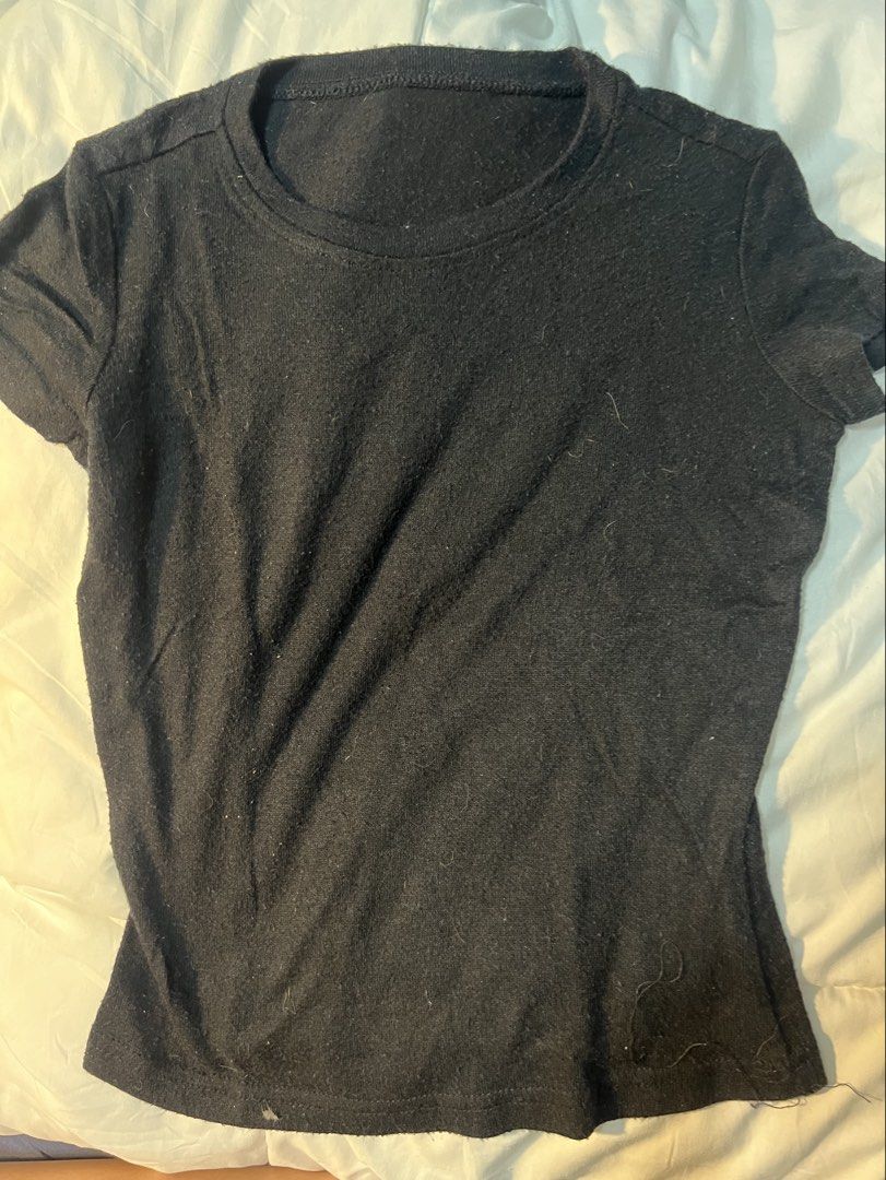 Black short-sleeve t-shirt basic crew neck top (Category: Shirts) located in Marikina City. Submitted by yssacee (Listing ID 1468920053, Image 1). Description: - Color: Classic Black - Fits XS best - Condition: Pre-loved with some visible lint and fuzz on the surface - shipping from lower antipolo rizal.