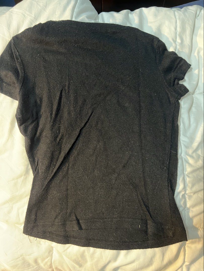 Black short-sleeve t-shirt basic crew neck top (Category: Shirts) located in Marikina City. Submitted by yssacee (Listing ID 1468920053, Image 2). Description: - Color: Classic Black - Fits XS best - Condition: Pre-loved with some visible lint and fuzz on the surface - shipping from lower antipolo rizal.