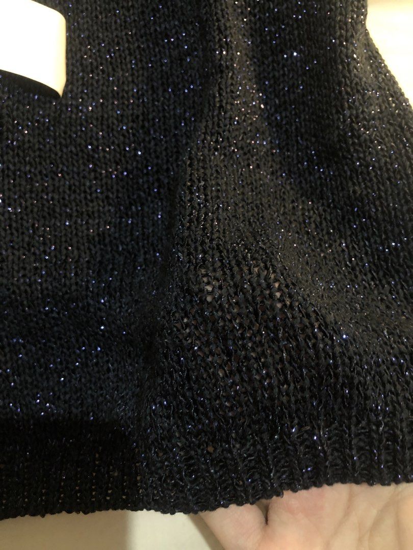 black chic 2000s sparkly knit tank tee (Category: Sleeveless) located in Manila. Submitted by blehgnbao (Listing ID 1468771885, Image 2). Description: 🤍 from cavite area •never worn only stored in closet •metallic and much more shiny irl • perf for layering and night outings •unbranded sf covered by buyer :) lalamove delivery & gcash payment only. dm for more details!.