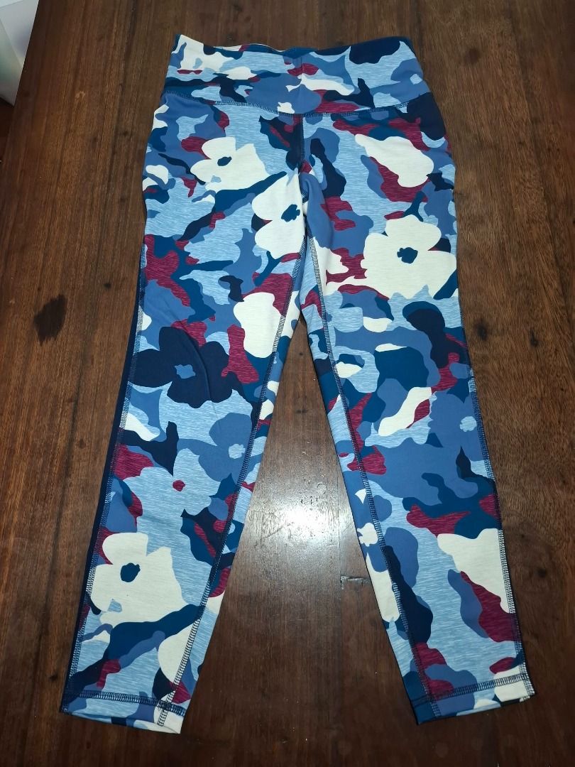 Blue Floral Camo Workout Leggings (Category: Activewear) located in Pasig City. Submitted by dripcounty (Listing ID 1468838431, Image 1). Description: Blue Floral Camo Workout Leggings ₱180 Size: Unconfirmed — please confirm in chat Condition: Preloved; please check actual photos Workout leggings with blue, white and burgundy floral/camouflage print and a wide waistband. Brand unconfirmed. Actual item shown in photos. Delivery fee shouldered by b