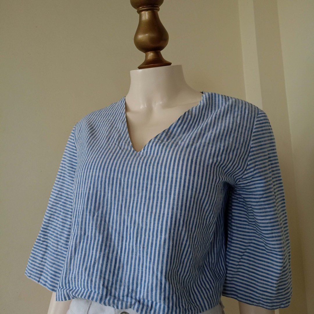 Blue pinstripe top (Category: Blouses) located in Barugo. Submitted by green.trendsetter (Listing ID 1468754749, Image 2). Description: AUSSIE PRELOVED FINDS Australian brand tops. Shop your next wardrobe favourite at a preloved price! 📌 SHOP REMINDERS — PLEASE READ BEFORE BUYING ❌ NO CANCELLATION once your order is confirmed. ❌ NO FUSSY BUYERS — please read the details and check all photos before buying. ❌ NO RETURN / NO EXCHANGE. ❌ NO RUSH SHI