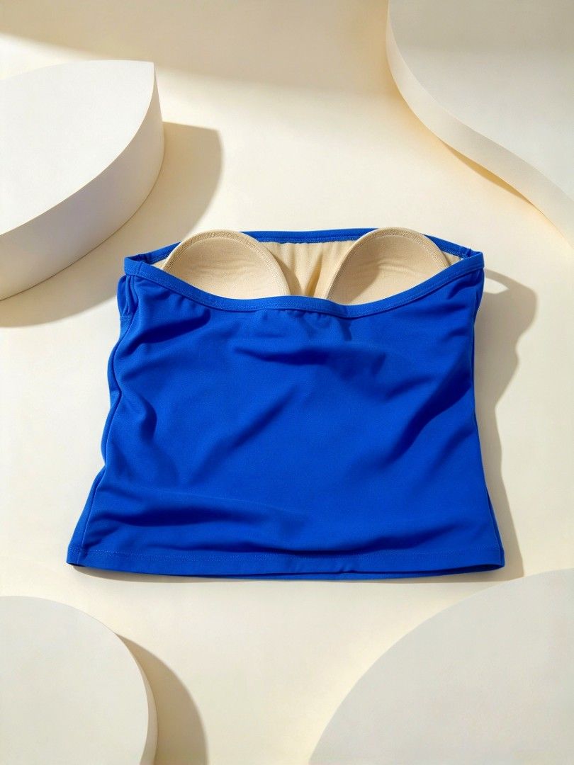 Blue strapless tankini top with built-in padding (Category: Bikinis & Swimsuits) located in Batangas. Submitted by mace2014 (Listing ID 1468712824, Image 1). Description: - Color: Bright royal blue - Style: Strapless tankini top with a clean straight neckline - Support: Built-in nude-colored padded cups for extra coverage and support - Versatility: Great basic piece for swimming, beach trips, or vacations - Condition: Like new/Excellent quality.