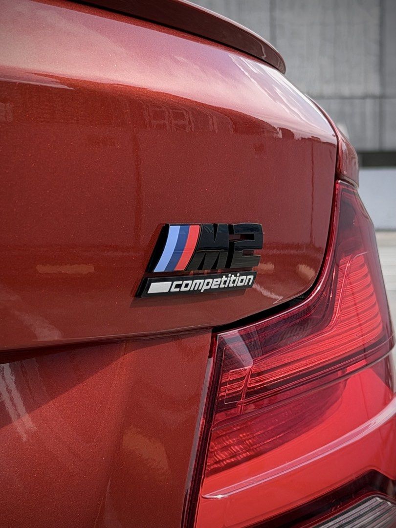 BMW M2 Competition Package (A) (Category: Used Cars) located in Pasig City. Submitted by gtautoph (Listing ID 1468777472, Image 2). Description: ⬛️🟥🟨 FOR SALE 🟨🟥⬛️ 2020 BMW M2 Competition 1 of 1 Sunset Orange 17k Kilometers ONLY All Stock All Original 3.0-liter TwinPower Turbo Inline-6 7-speed Dual-Clutch Transmission 410hp Original Paint Harman Kardon Surround Sound System M Sport Seats Apple CarPlay Adaptive LED Headlights Plate # Ending: 5