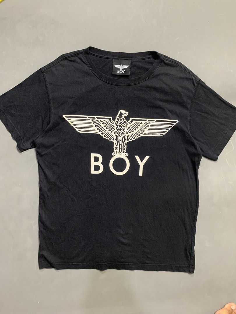 BOY London Black Eagle Logo T-Shirt (Category: Tshirts & Polo Shirts ) located in Kalibo. Submitted by gneiss2002 (Listing ID 1468846690, Image 1). Description: - Brand: BOY London - Color: Classic Black - Design: Iconic white eagle graphic with block lettering on chest and back design BOY - Material: Soft, premium cotton for daily comfort - Fit: Standard crew neckline and short sleeves - Condition: Excellent / Well-maintained - Style: Casual str