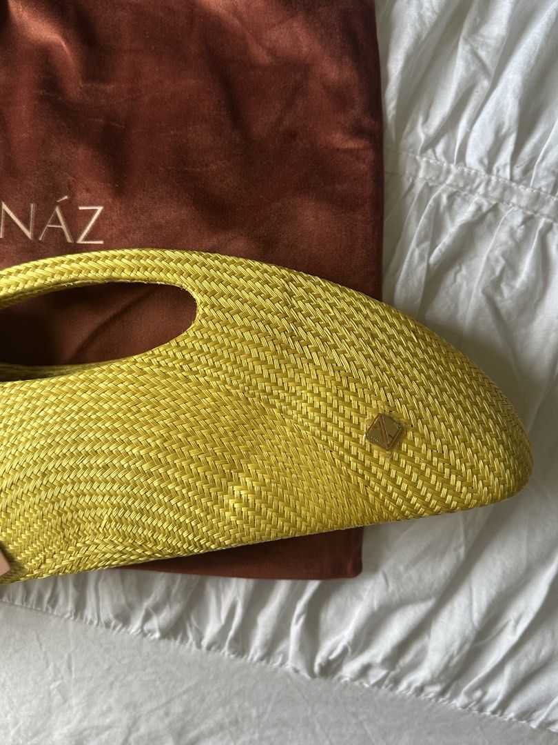 BRAND NEW Aranaz Amor 2 Mini - Yellow (Category: Clutches) located in Quezon City. Submitted by cstuff_forsale (Listing ID 1468749073, Image 2). Description: Last price posted! Brand new, with tags, never used! Comes with dust bag, care card, and bag tags.