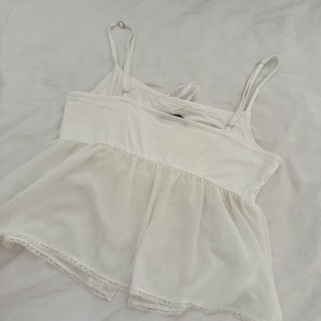 Brandy Melville Lace Cami Top (Category: Sleeveless) located in Davao. Submitted by aug_amari (Listing ID 1468732009, Image 3). Description: size fits Xs-S so cute.
