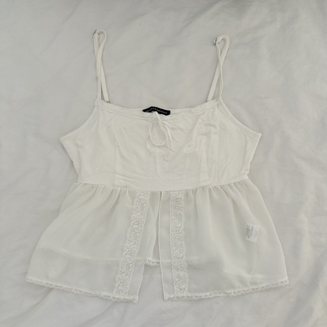 Brandy Melville Lace Cami Top (Category: Sleeveless) located in Davao. Submitted by aug_amari (Listing ID 1468732009, Image 1). Description: size fits Xs-S so cute.