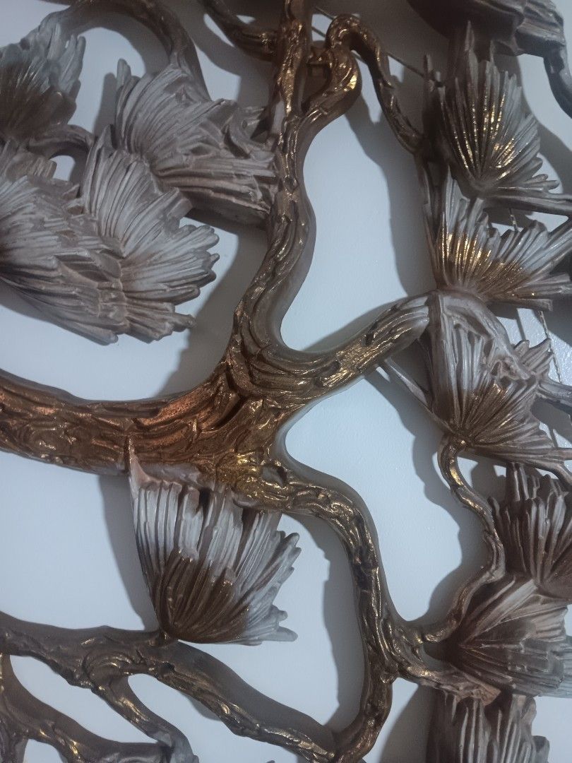 Bronze and silver bonsai tree wall art sculpture (Category: Wall Decor) located in Las Pinas. Submitted by jesus1smysavi0r (Listing ID 1468730803, Image 1). Description: - Large decorative bonsai tree wall sculpture - Measures approximately 4 feet wide - Bronze-toned branches with textured silver and white leaf clusters - Sturdy metal construction - Includes mounting wire on the back for easy hanging - Ideal statement piece for living rooms or en