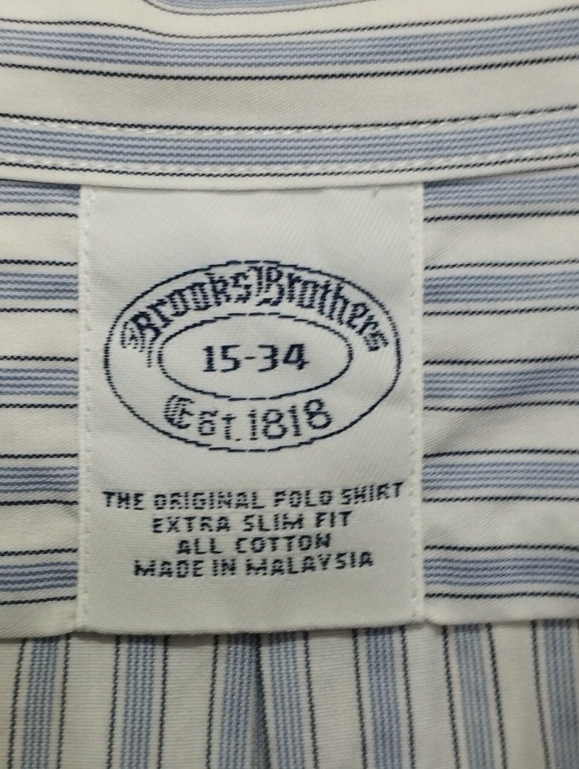 Brooks Brothers (Category: Formal Shirts) located in San Fernando. Submitted by nerosales (Listing ID 1468730831, Image 2). Description: Brooks Brothers Button Down Shirt width - 19 inches length - 30 inches good condition, no stain, no tear 450 pesos only SM City Pampanga Shipping: J&T Payment: Gcash NO COD NO COP NO WAYBILL FIRST.