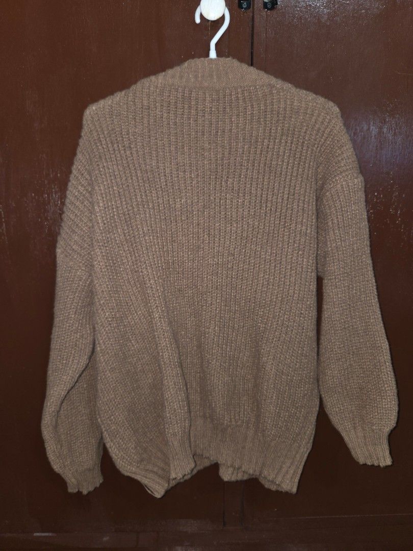 Brown Cardigan w/ Buttons (Category: Coats, Jackets and Outerwear) located in Quezon City. Submitted by panchie32 (Listing ID 1468907106, Image 2). Description: Brandless Brown Cardigan with Black Buttons Selling this brown buttoned cardigan! It's been washed but never worn. Item is free sized but can be stretched up until 2XL (2XL is my usual size and it still fits me). Condition: Washed but never used RFS: Realized it's not for me since I'm som