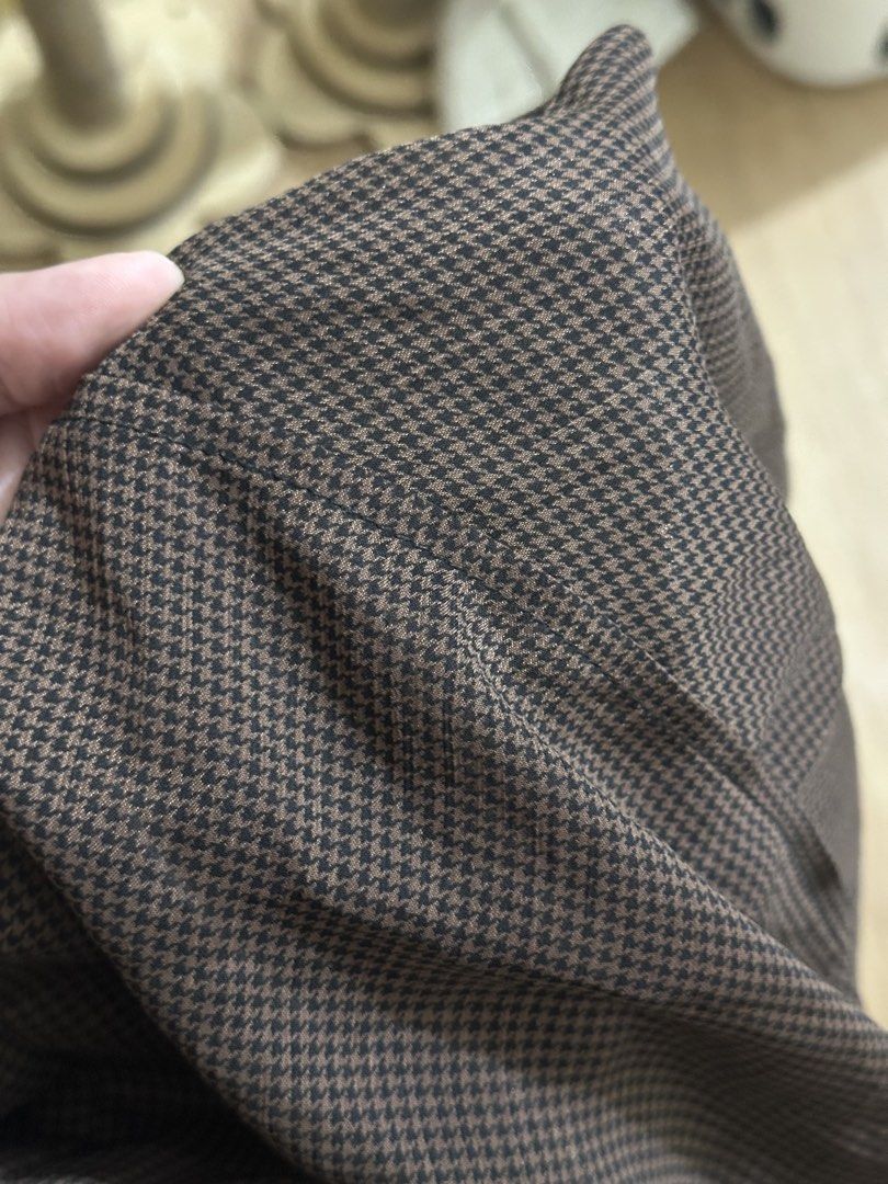 Brown Tiered Maxi Skirt with Houndstooth Pattern (Category: Skirts) located in Villasis. Submitted by juliaxgamboa (Listing ID 1468809552, Image 2). Description: - Style: Midi skirt with 3 ruffled tiers - Pattern: Subtle all-over houndstooth - Color: Classic brown - Waistband: Comfy elastic for easy slip-on - Fit & Pairing: Great for daily wear, matches well with basic black tops or fitted tanks - Condition: Excellent / Ready to wear.